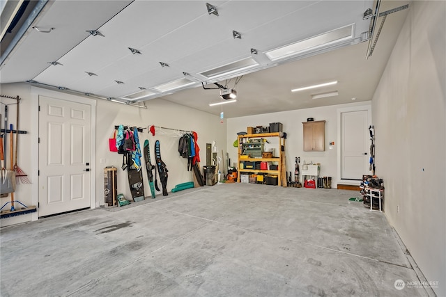 garage featuring a garage door opener