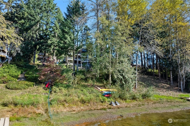 view of yard with a water view