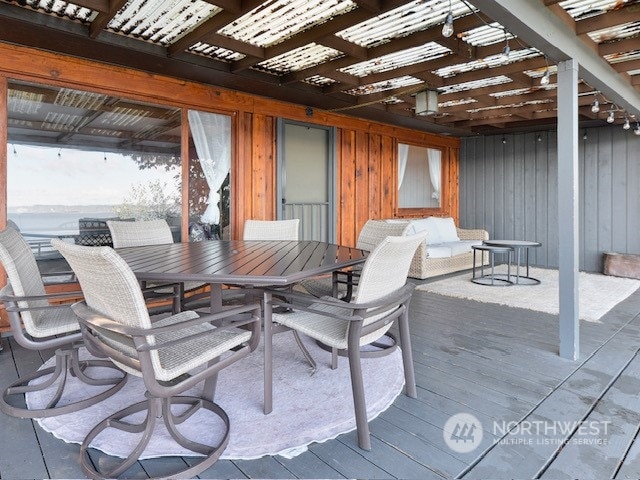 wooden deck with a pergola