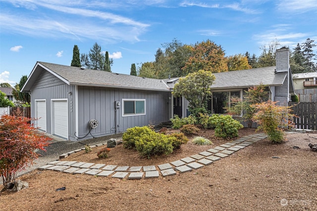 ranch-style home with a garage