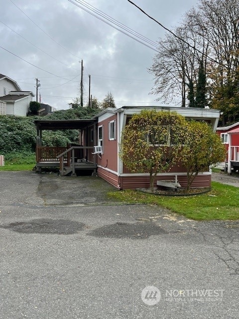 105 Cox Unit 12, Arlington, WA 98223 - view of front of home with cooling unit