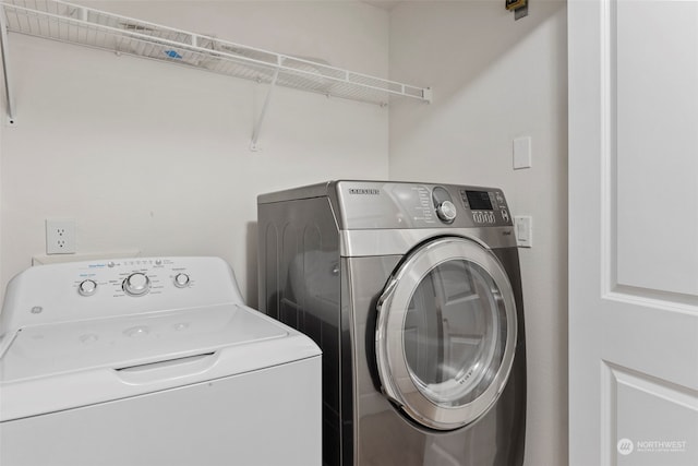 laundry area featuring separate washer and dryer