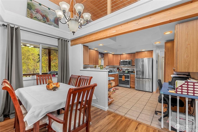 456 Hinthorne Ln, Leavenworth, WA 98826 - dining area with a chandelier, light tile patterned floors, and recessed lighting