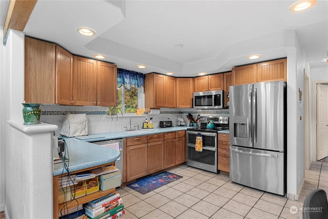 456 Hinthorne Ln, Leavenworth, WA 98826 - kitchen with stainless steel appliances, light tile patterned floors, tasteful backsplash, recessed lighting, and light countertops