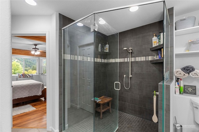 456 Hinthorne Ln, Leavenworth, WA 98826 - bathroom featuring ensuite bathroom, a ceiling fan, a shower stall, and tile patterned flooring