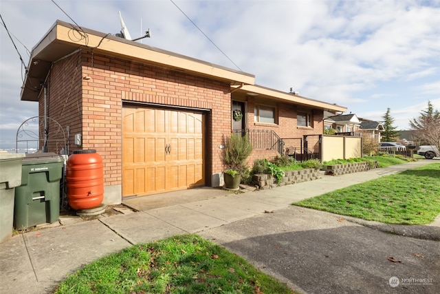 view of home's exterior with a garage