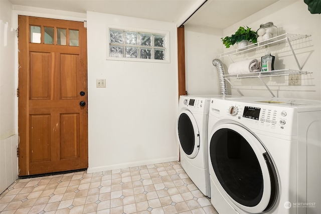 washroom featuring independent washer and dryer