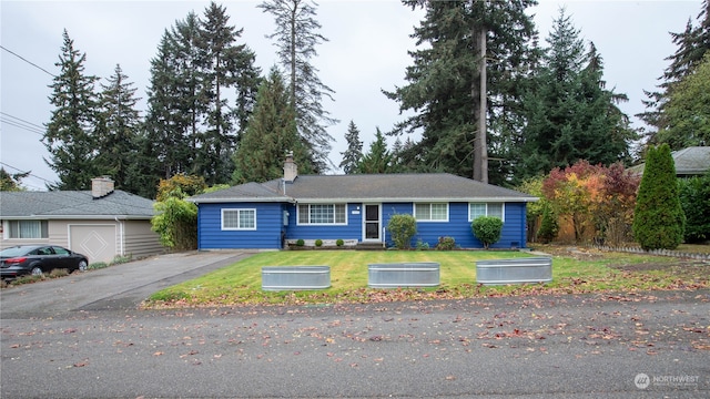 ranch-style home with a front lawn