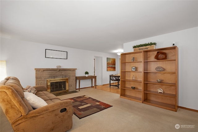 carpeted living room with a brick fireplace