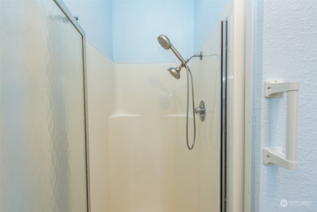 bathroom featuring walk in shower