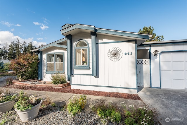 view of front of property with a garage