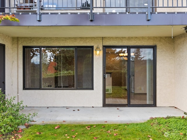 property entrance with a balcony