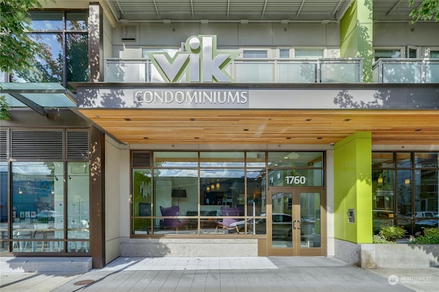 entrance to property with a balcony