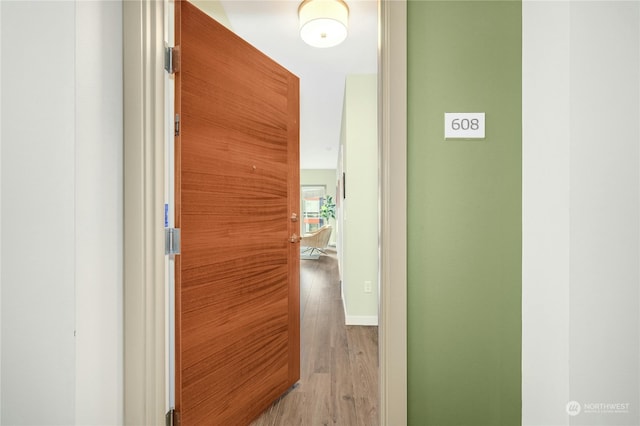 hall with light wood-type flooring