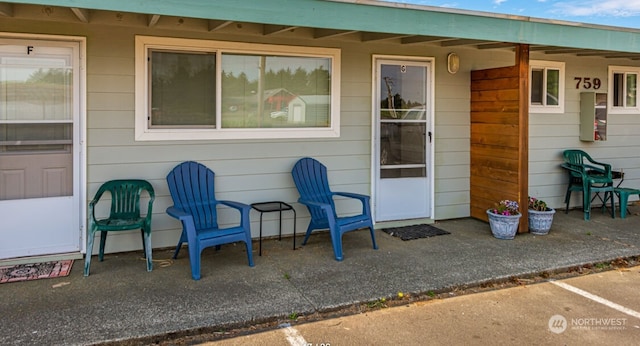 759 Ocean Shores Blvd NW Unit G, Ocean Shores, WA 98569 - view of exterior entry featuring a patio