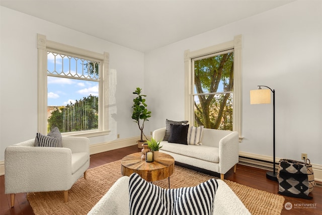 sitting room with hardwood / wood-style floors