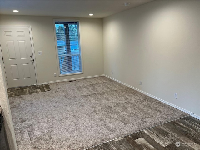 507 131st St E Unit L, Tacoma, WA 98445 - spare room featuring wood finished floors, baseboards, and recessed lighting