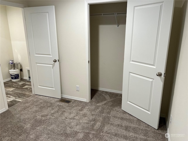 507 131st St E Unit L, Tacoma, WA 98445 - unfurnished bedroom with visible vents, baseboards, carpet flooring, and a closet