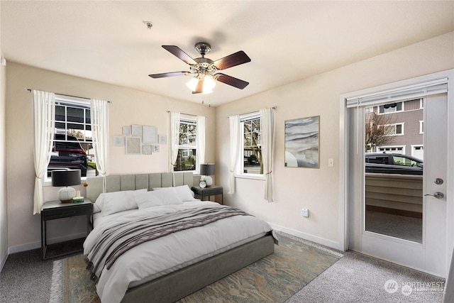 carpeted bedroom with ceiling fan