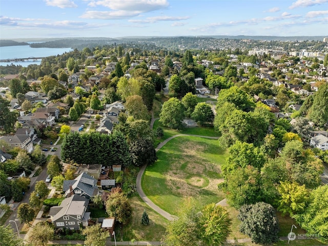 birds eye view of property featuring a water view