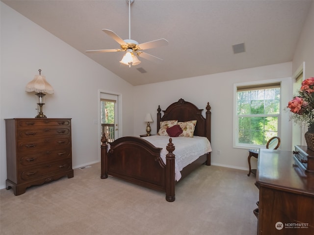 bedroom featuring ceiling fan, light carpet, and lofted ceiling