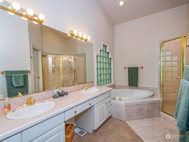 bathroom featuring vanity, tile patterned floors, lofted ceiling, and separate shower and tub