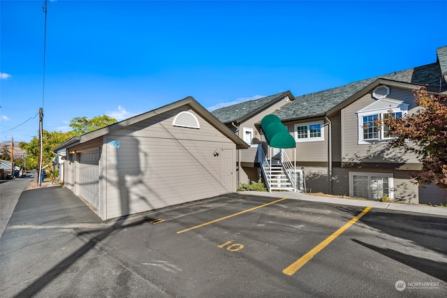 view of parking with a garage