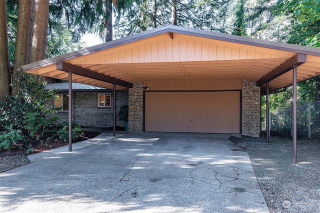 view of front facade featuring a carport and a garage