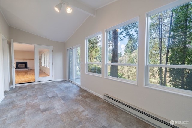 unfurnished sunroom with a baseboard heating unit and lofted ceiling with beams