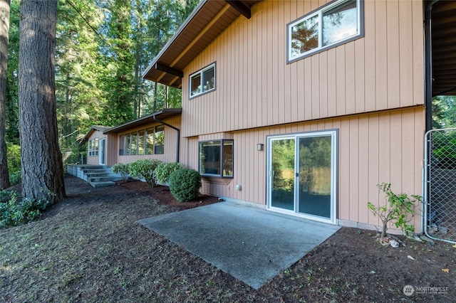 back of house featuring a patio