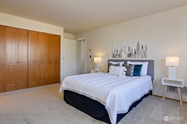 bedroom with a closet and carpet floors