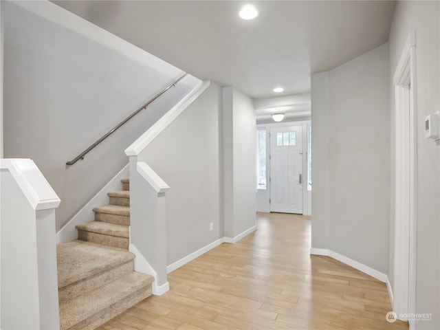 foyer with light hardwood / wood-style flooring