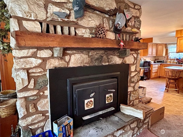 1410 E Sanpoil Rd, Keller, WA 99140 - detailed view of black microwave and a fireplace
