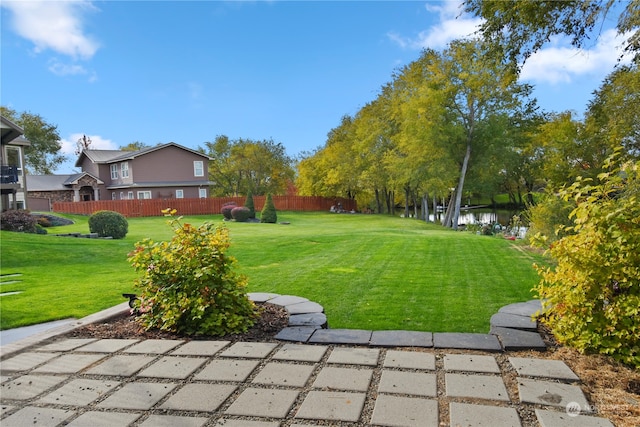 view of yard with a water view