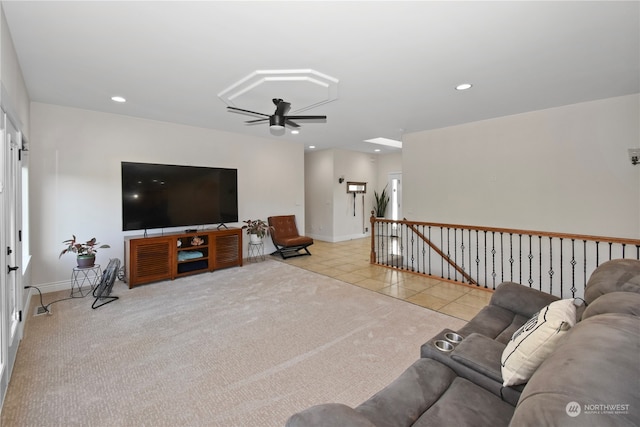 tiled living room with ceiling fan