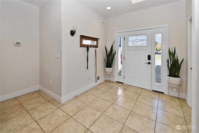 view of tiled foyer entrance