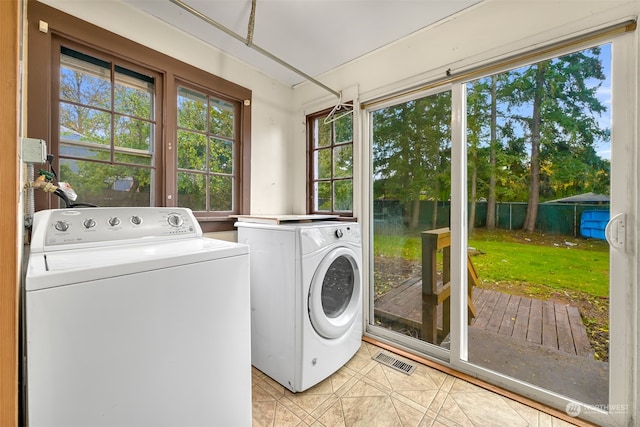 laundry area featuring separate washer and dryer