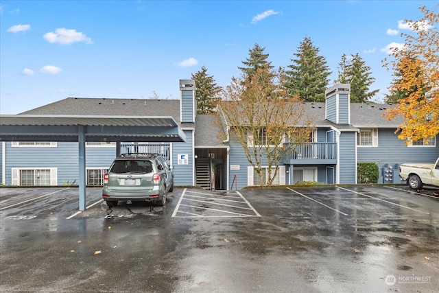 exterior space with a carport