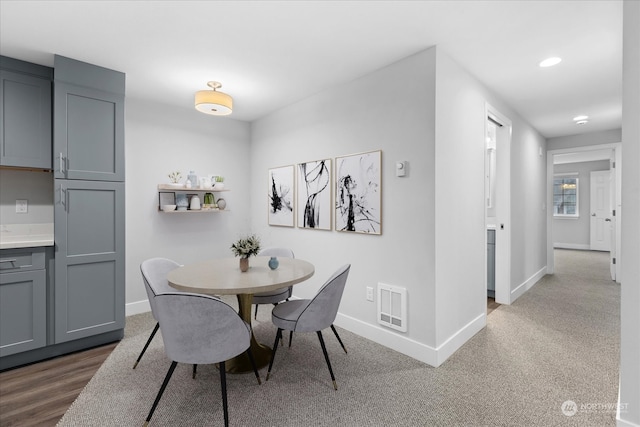 dining room featuring hardwood / wood-style flooring