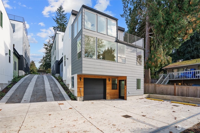 view of front of property with a garage