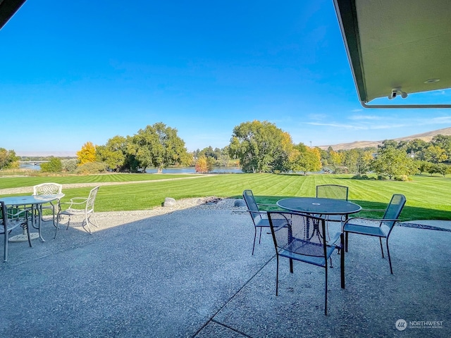 view of patio / terrace with a mountain view