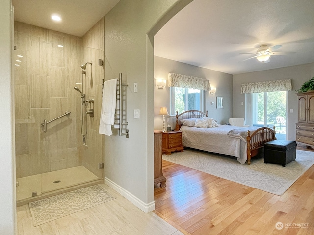 bedroom featuring hardwood / wood-style floors and ceiling fan