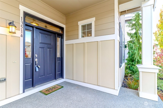 property entrance featuring a porch