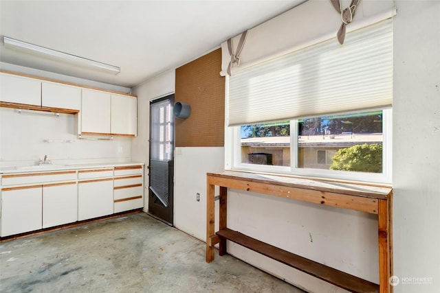 kitchen with sink and white cabinets