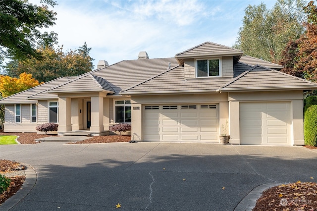 view of front of property featuring a garage