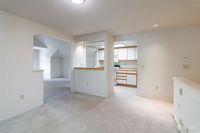 empty room with light colored carpet