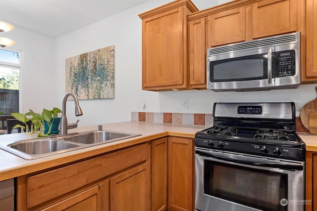 kitchen featuring stainless steel appliances and sink