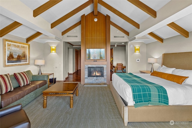 bedroom featuring vaulted ceiling with beams and hardwood / wood-style floors