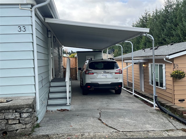 view of parking / parking lot with a carport