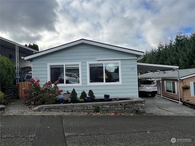 view of front of house with a carport